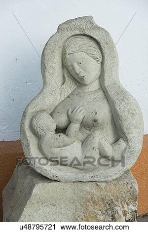 Statue of a breastfeeding mother with baby, Copan, Copan Ruinas, Honduras View Large Photo Image Stock Image - Statue of a breastfeeding mother with baby, Copan, Copan Ruinas, Honduras. Fotosearch