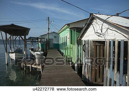 Stilt houses at dock, Cayman Cay, Utila Island, Bay Islands, Honduras View Large Photo Image Stock Photo - Stilt houses at dock, Cayman Cay, Utila Island, Bay Islands, Honduras. Fotosearch