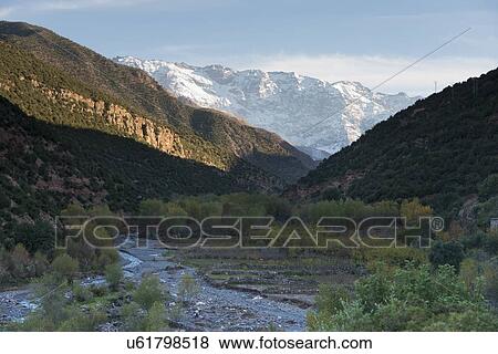 Stream flowing through mountains, Atlas Mountains, Morocco View Large Photo Image Stock Photo - Stream flowing through mountains, Atlas Mountains, Morocco. Fotosearch