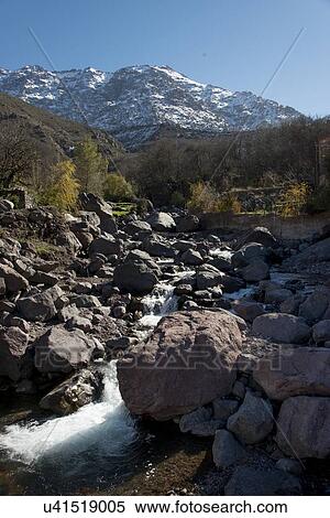 Stream flowing through mountains, Imlil, Atlas Mountains, Morocco View Large Photo Image Stock Photography - Stream flowing through mountains, Imlil, Atlas Mountains, Morocco. Fotosearch