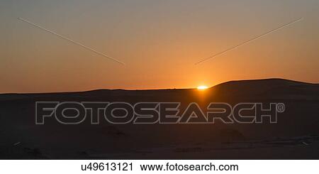 Sunset over Erg Chegaga Dunes in Sahara Desert, Morocco View Large Photo Image Stock Image - Sunset over Erg Chegaga Dunes in Sahara Desert, Morocco. Fotosearch
