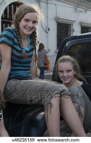 Teenage girls on truck and smiling, Barrio El Centro, Copan, Copan Ruinas, Honduras View Large Photo Image Stock Photo - Teenage girls on truck and smiling, Barrio El Centro, Copan, Copan Ruinas, Honduras. Fotosearch