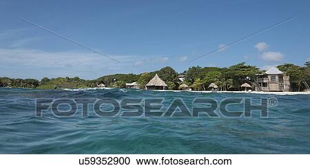 Tourists resort on the beach, Utopia Village, Utila Island, Bay Islands, Honduras View Large Photo Image Stock Image - Tourists resort on the beach, Utopia Village, Utila Island, Bay Islands, Honduras. Fotosearch