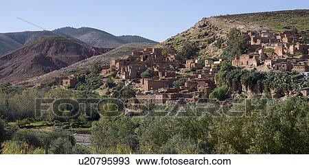 Traditional buildings in town at mountainside, Ouarzazate, Morocco View Large Photo Image Stock Image - Traditional buildings in town at mountainside, Ouarzazate, Morocco. Fotosearch