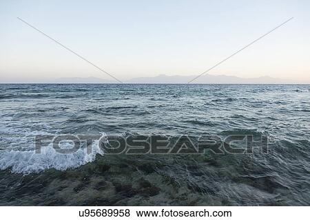 Waves splashing in the sea, Bay Islands, Honduras View Large Photo Image Stock Photo - Waves splashing in the sea, Bay Islands, Honduras. Fotosearch