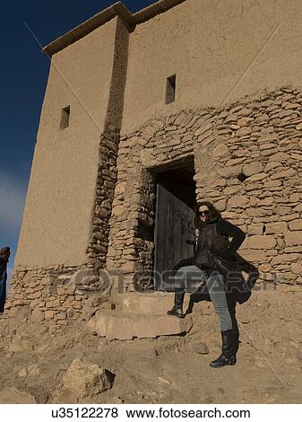 Stock Photo - Woman at a fort, Ait Benhaddou, Ouarzazate, Souss-Massa-Draa, Morocco. Fotosearch