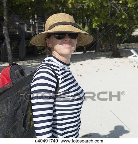 Woman on the beach, Utila, Bay Islands, Honduras View Large Photo Image Stock Photo - Woman on the beach, Utila, Bay Islands, Honduras. Fotosearch