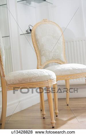 Stock Photo - Chairs in store. Fotosearch