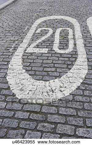 Stock Photography - Number 20 painted on cobbled street in London, UK. Fotosearch