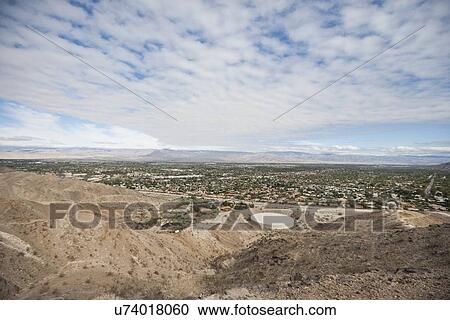 Stock Image - View of landscape with overcast sky. Fotosearch