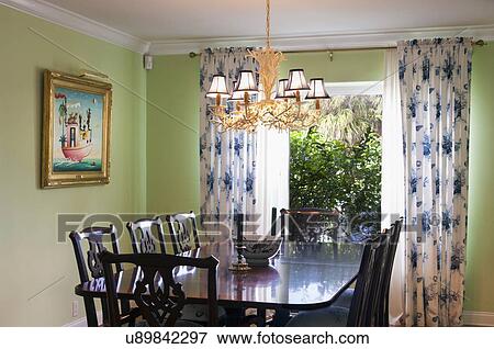 Picture Of Chandelier Over Table And Chairs In Contemporary Dining Chandelier Over Table And Chairs In Contemporary Dining Room West Palm Beach Usa