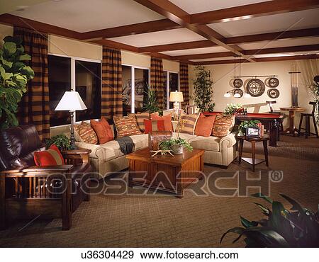 Simple Furniture And Coffered Ceiling In Living Room Stock Photo