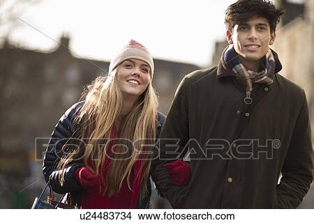 Picture - A young couple shop in the Grassmarket in Edinburgh, Scotland. Fotosearch