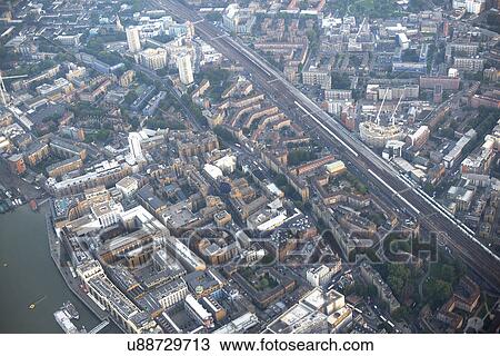 Aerial view of rail tracks and the city, London, UK View Large Photo Image Stock Image - Aerial view of rail tracks and the city, London, UK. Fotosearch