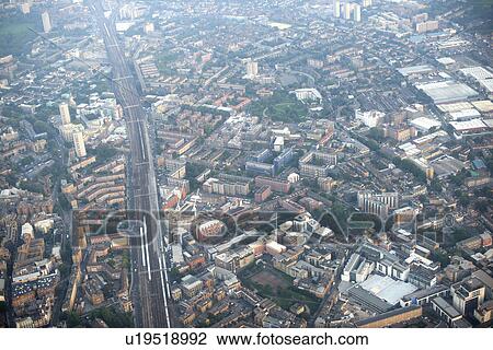 Aerial view of railway and the city, London, UK View Large Photo Image Stock Image - Aerial view of railway and the city, London, UK. Fotosearch