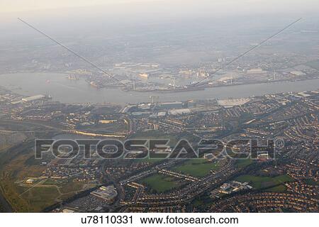 Stock Image - Aerial view of the Thames and London, UK. Fotosearch