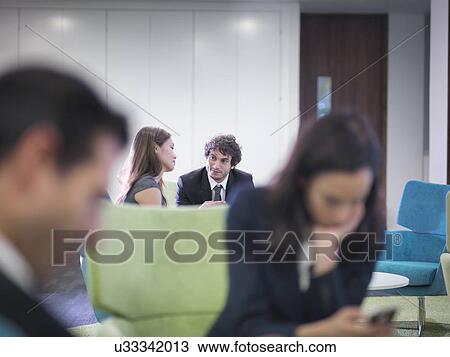 Business colleagues in meeting in office View Large Photo Image Stock Image - Business colleagues in meeting in office. Fotosearch