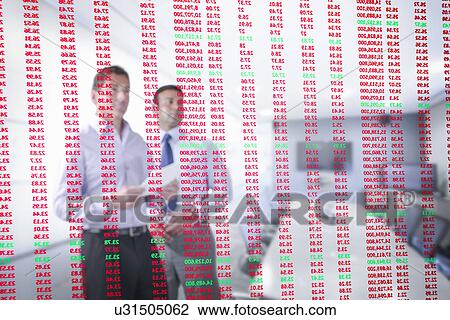 Businessmen looking at red and green figures seen through screen View Large Photo Image Stock Image - Businessmen looking at red and green figures seen through screen. Fotosearch