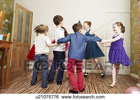 Children dancing at birthday party View Large Photo Image Stock Photograph - Children dancing at birthday party. Fotosearch