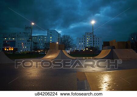 Cityscape and skateboard park at night View Large Photo Image Picture - Cityscape and skateboard park at night. Fotosearch