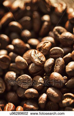 Stock Image - Close up of coffee beans. Fotosearch