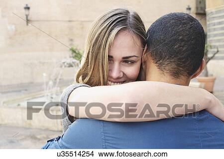Close up of tourist couple hugging, Valencia, Spain View Large Photo Image Picture - Close up of tourist couple hugging, Valencia, Spain. Fotosearch
