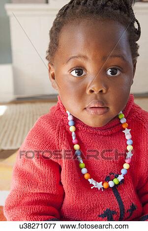Stock Photo - Close up portrait of female toddler. Fotosearch