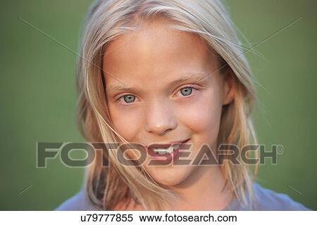 Stock Photography - Close up portrait of girl with blond hair. Fotosearch
