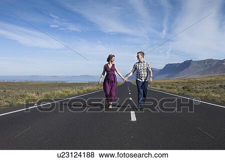 Couple at start of life's journey together View Large Photo Image Stock Photo - Couple at start of life's journey together. Fotosearch