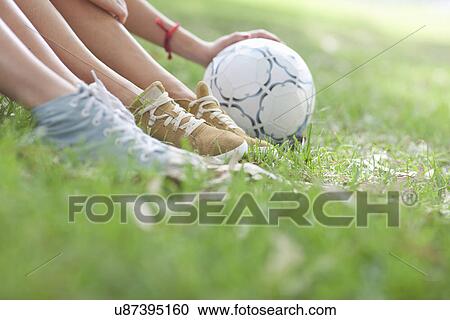 Cropped shot of young womens legs and soccer ball View Large Photo Image Stock Image - Cropped shot of young womens legs and soccer ball. Fotosearch