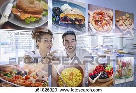 Customers choosing food from interactive display in office canteen View Large Photo Image Stock Photo - Customers choosing food from interactive display in office canteen. Fotosearch