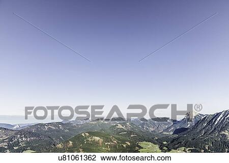 Distant view of mountain landscape, Achensee, Tyrol, Austria View Large Photo Image Stock Image - Distant view of mountain landscape, Achensee, Tyrol, Austria. Fotosearch