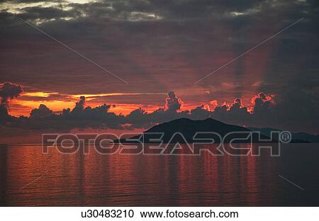 Dramatic sunset over tranquil sea, Fethiye, Turkey View Large Photo Image Stock Image - Dramatic sunset over tranquil sea, Fethiye, Turkey. Fotosearch
