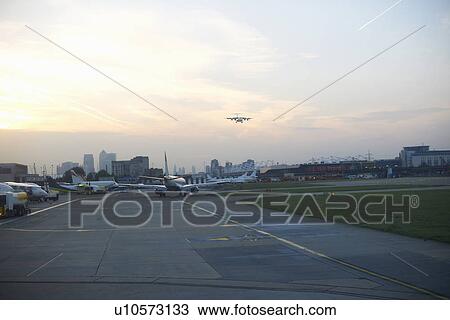 Elevated view of airport runway and aircraft, London, UK View Large Photo Image Stock Image - Elevated view of airport runway and aircraft, London, UK. Fotosearch