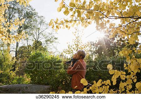 Father and son in park View Large Photo Image Stock Photography - Father and son in park. Fotosearch