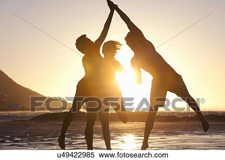 Friends jumping by seaside View Large Photo Image Stock Photography - Friends jumping by seaside. Fotosearch
