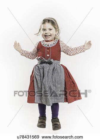 Girl jumping with arms open View Large Photo Image Stock Photo - Girl jumping with arms open. Fotosearch