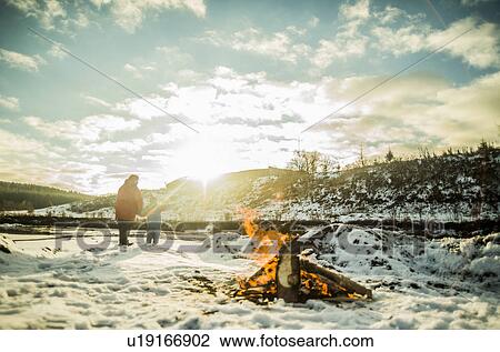 Grandmother and young grandson in winter sunlight View Large Photo Image Stock Image - Grandmother and young grandson in winter sunlight. Fotosearch