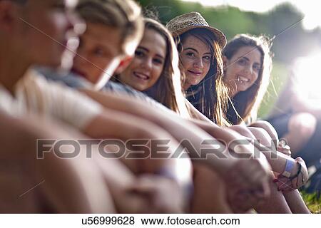 Group of friends chatting View Large Photo Image Stock Photo - Group of friends chatting. Fotosearch