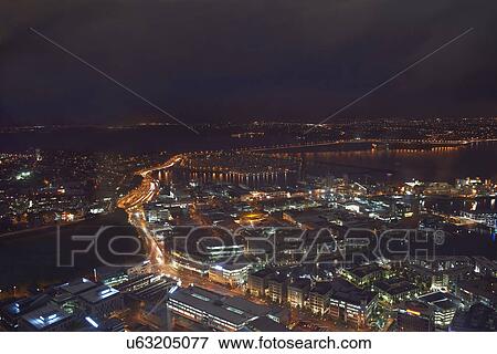Stock Photo - High angle view of Auckland at night, New Zealand. Fotosearch