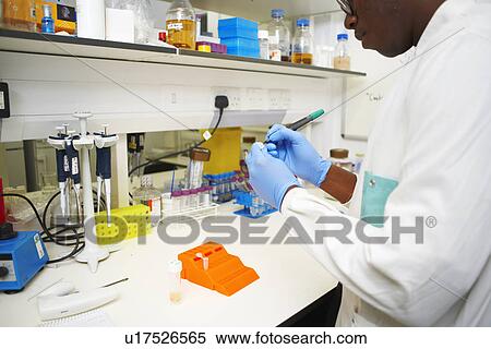 Male scientist using writing test tube label View Large Photo Image Stock Photography - Male scientist using writing test tube label. Fotosearch