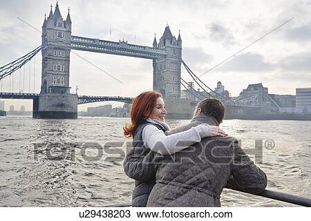 Mature tourist couple and Tower Bridge, London, UK View Large Photo Image Stock Image - Mature tourist couple and Tower Bridge, London, UK. Fotosearch