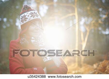 Mature woman wearing knit hat and red coat View Large Photo Image Stock Photo - Mature woman wearing knit hat and red coat. Fotosearch