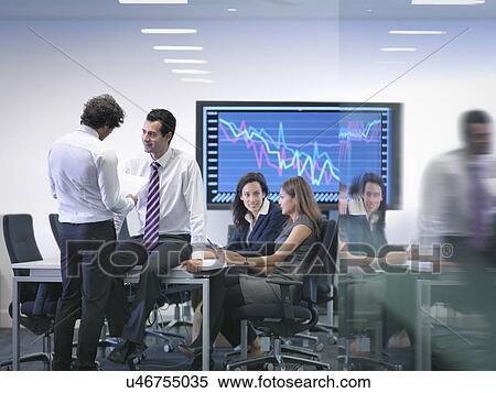 Office colleagues in informal meeting View Large Photo Image Stock Photography - Office colleagues in informal meeting. Fotosearch