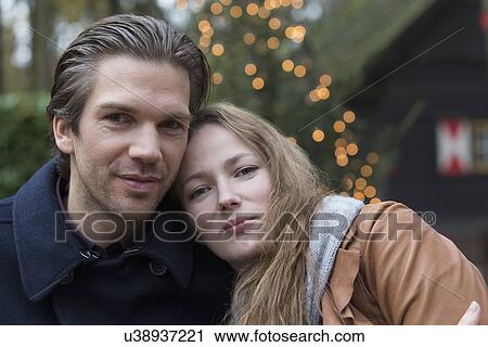 Portrait of a couple outdoors View Large Photo Image Stock Image - Portrait of a couple outdoors. Fotosearch