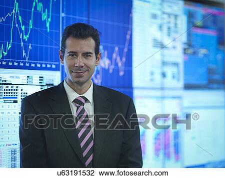 Portrait of businessman in front of presentation on graphical screens View Large Photo Image Stock Image - Portrait of businessman in front of presentation on graphical screens. Fotosearch
