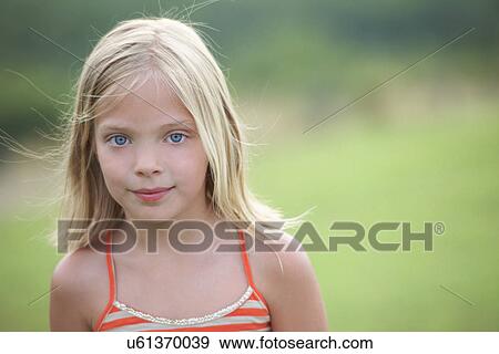 Portrait of girl with blond hair View Large Photo Image Stock Photo - Portrait of girl with blond hair. Fotosearch