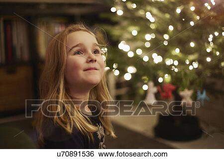 Portrait of young girl at christmas View Large Photo Image Stock Photograph - Portrait of young girl at christmas. Fotosearch