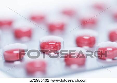 Stock Image - Pseudoephedrine hydrochloride pills in blister pack. Fotosearch