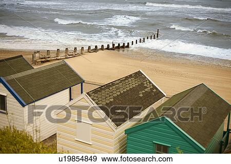 Stock Photo - Row of beach huts, Southwold, Suffolk, UK. Fotosearch